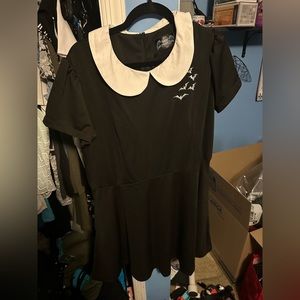 Black collared dress with bat embroidery